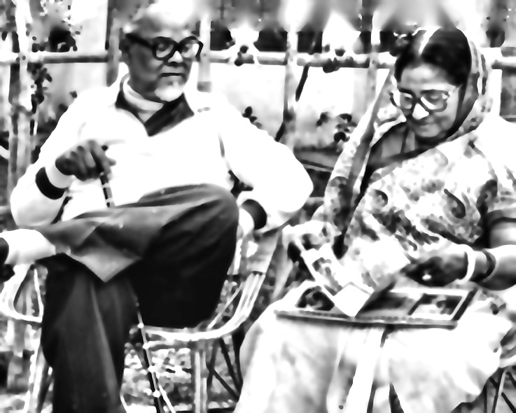 Syed Shamsur Rahman and his wife seated outdoors